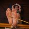 Long classic bastinado for Lada – Multiple blows on her feet with a stick