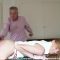 A leather paddle, a bare bottom and a firm spanking for Amelia Rutherford