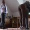 Belinda Lawson’s jutting bottom is soundly caned, held on Helen’s back